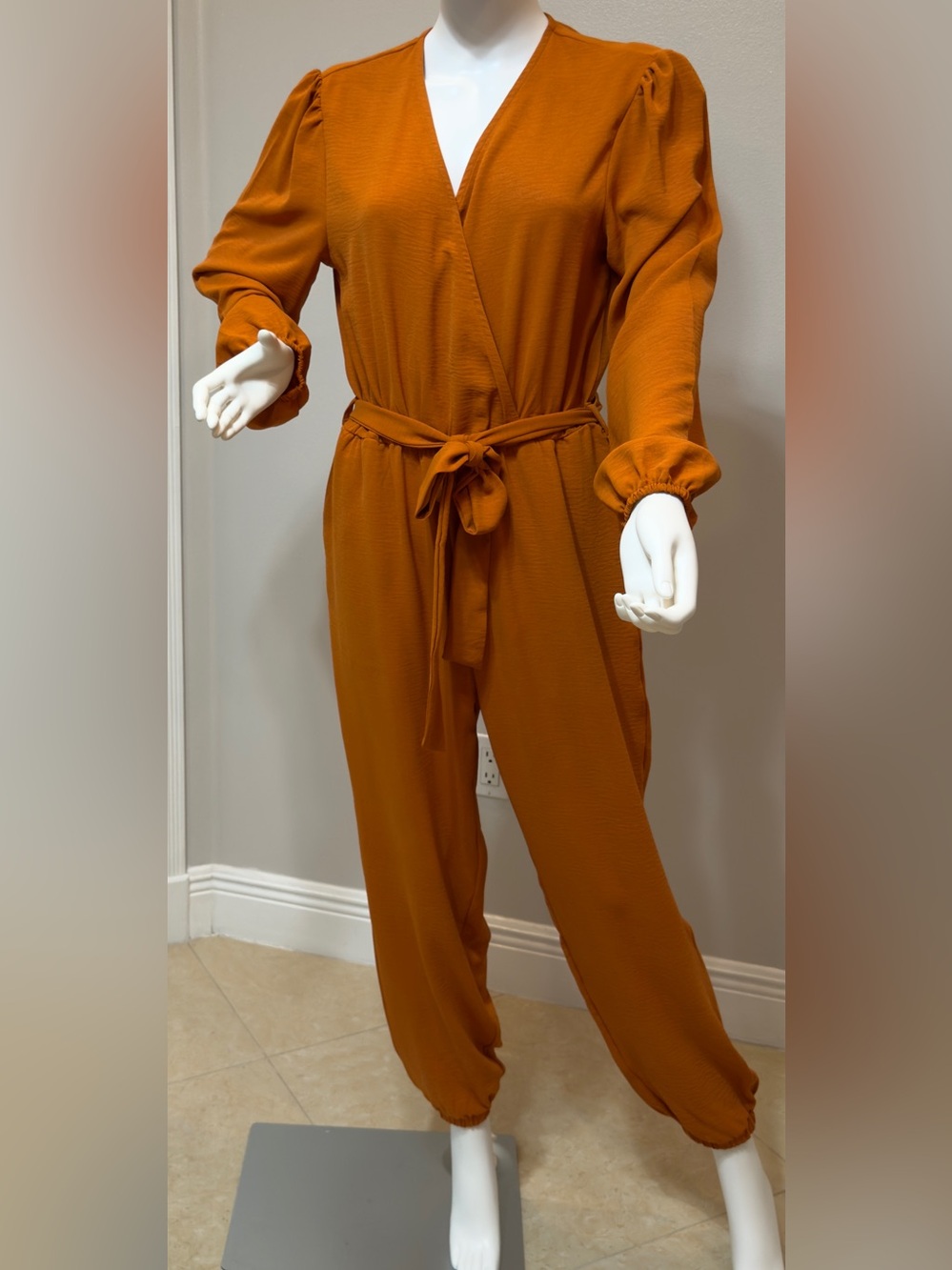 Pretty Garden Chic Women's Long Sleeve Tie-Waist Jumpsuit - Rust Medium.